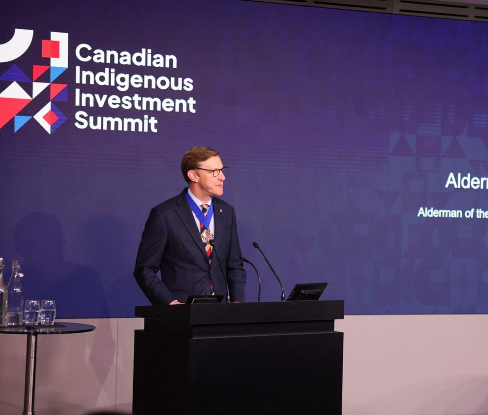 Alderman Robert Hughes-Penney delivered a welcome address at The Canadian Indigenous Investment Summit on behalf of The Rt Hon. the Lord Mayor Alastair King and the City of London Corporation.